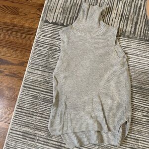 Gray turtleneck sleeveless sweater